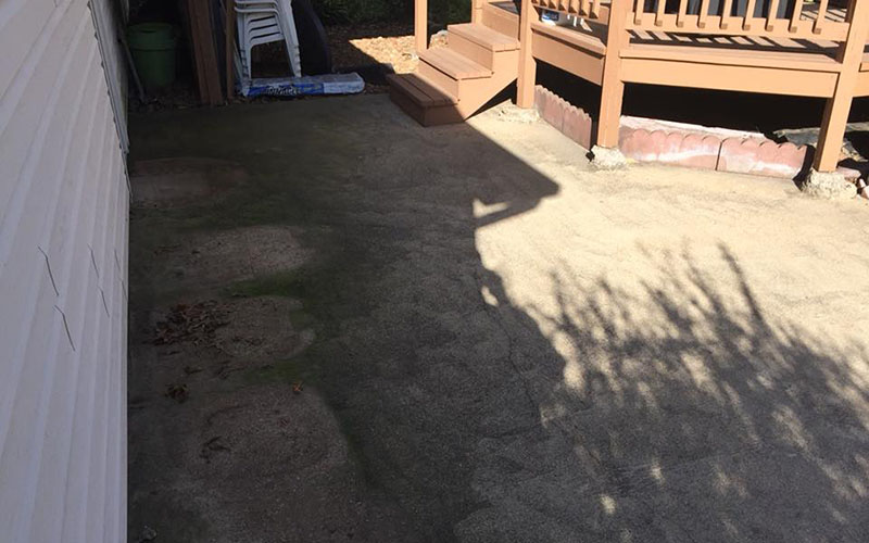 Just Clean Pressure Washing provides quality concrete porch cleaning